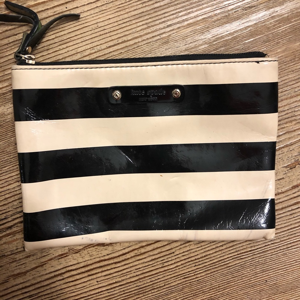 Kate Spade- slight worn but no marks or scratches